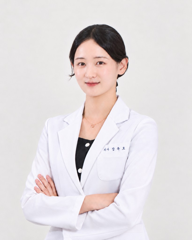 Portrait of Dr. Youro Kang wearing a white coat